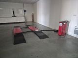 a red fire hydrant in the middle of a room