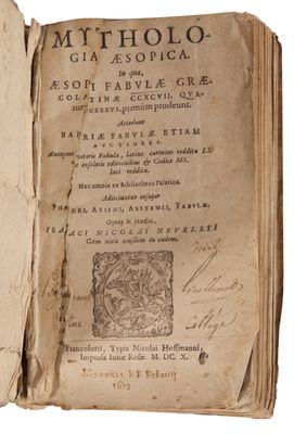 an old book opened to a page with a picture of a man on it