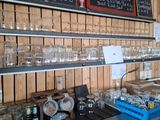many empty glasses on the shelves in the store
