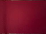 une peinture représentant un carré rouge sur une surface en bois