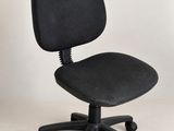 an image of a black office chair on wheels against a white background