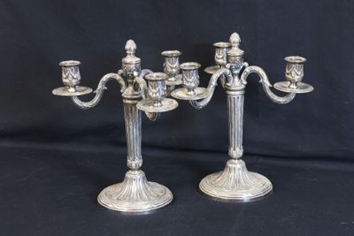 pair of antique silver plated candelabs with candles