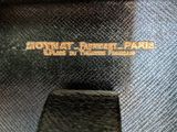 an image of a close up of a black bag with a label on it
