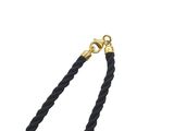 a close up of a black rope with a gold clasp on a white background