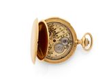 an image of a pocket watch with a gold case on a white background