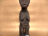 statue of a woman holding a baby in her arms