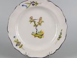 an image of a plate with birds and flowers on it