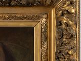 portrait of a woman in a gold frame with a white background