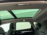 a view of the sunroof from the inside of a car