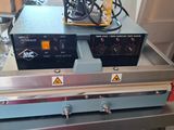 two machines that are sitting on a table