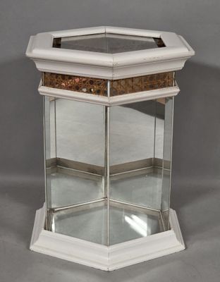 an image of a glass display case with a mirror on top