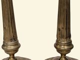 pair of antique brass candlesticks on marble bases