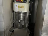 a machine that is sitting in the corner of a room