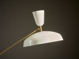 a close up of a lamp on a table with a black background