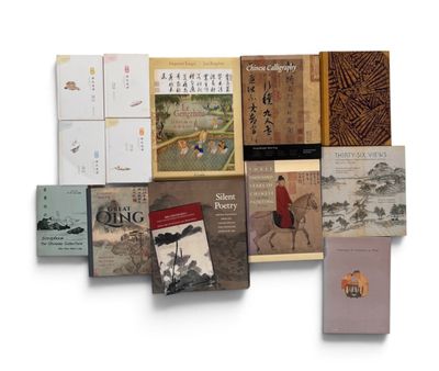 a lot of books that are sitting on a table