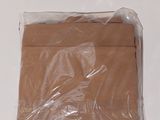 a bag of brown paper sitting on a white surface