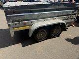 a trailer that is parked in the parking lot