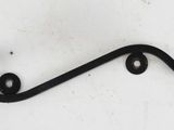 a black metal hook with two black balls on it