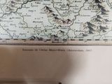a picture of a map of france on the wall