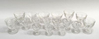 a lot of empty wine glasses sitting on a table