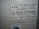 a label on the side of a machine indicating the time