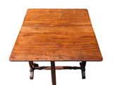 a wooden table with a wooden top on a white background