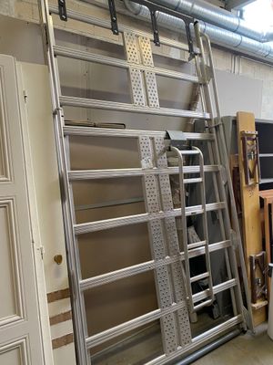 a ladder that is leaning against a wall in a garage