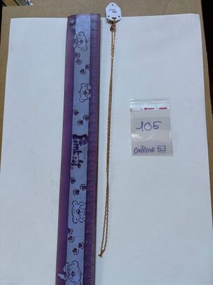 a picture of a purple ribbon with a tag on it