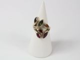 an image of a ring with multi colored stones on it