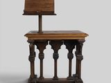an old wooden chair with a wooden seat and back rest