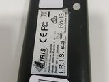a label on the back of a black cell phone
