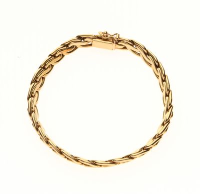 BRACELET en or jaune 750‰ à mailles entrelacées. - Photo 1
