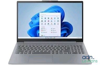 a close up of a laptop on a white surface with a blue background