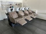 a row of chairs that are lined up in a salon