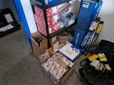 many boxes and boxes on a shelf in a room