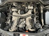 a picture of a car engine with its hood open
