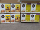 several boxes of coffee are stacked on top of each other