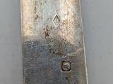 a knife that is laying on top of a table