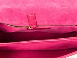 the inside of a pink purse with a zipper on it
