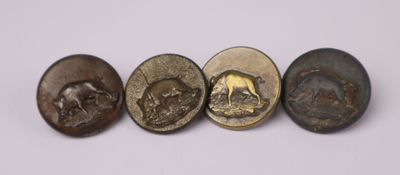 quatre types de boutons différents, sur lesquels figurent des images d'animaux