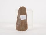 an image of a piece of rock with a tag on it