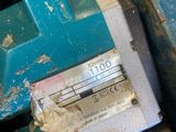 a close up of a machine with a meter on it ' s side