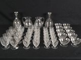 a lot of glass vases that are sitting on a table