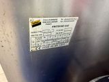 an image of a stainless steel container with a label on it