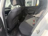 the back seats of a car with a black seat belt