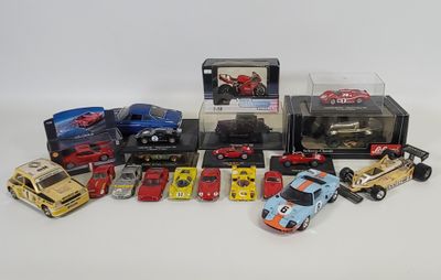 a lot of toy cars that are in a display case