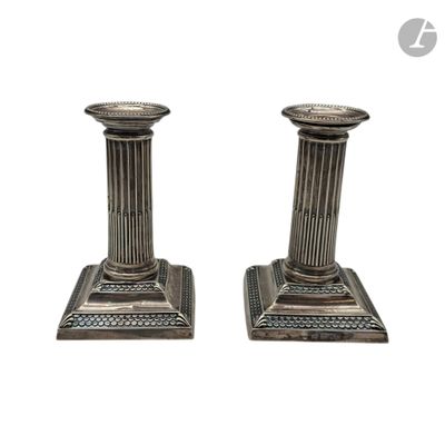 pair of antique silver candlesticks