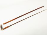 pair of antique wooden knitting needles on a white background