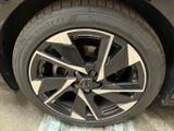 a close up of a tire on a car ' s rim
