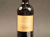 a bottle of wine that is sitting on a table